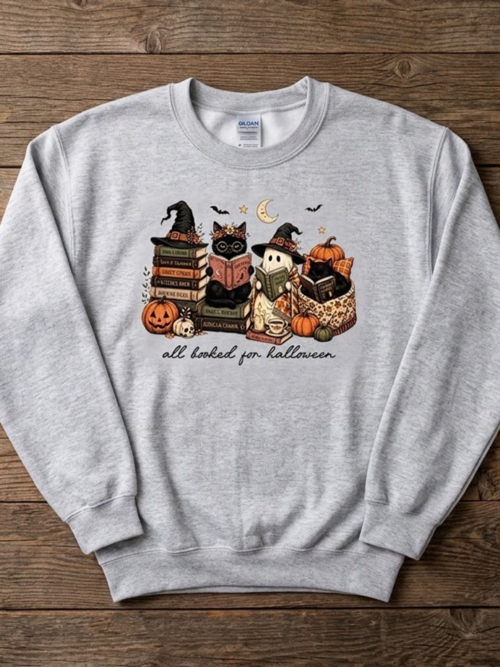 All booked for Halloween pumpkin cats book sweatshirt